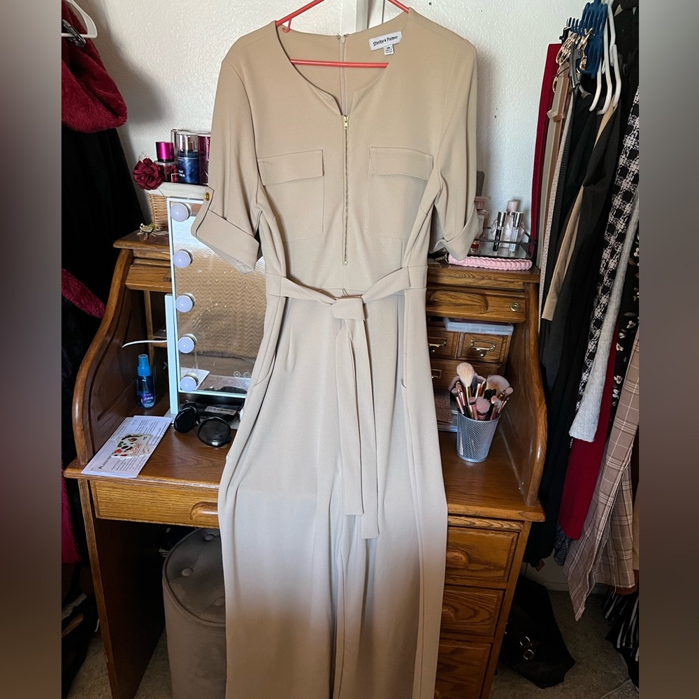 Tan jumpsuit.